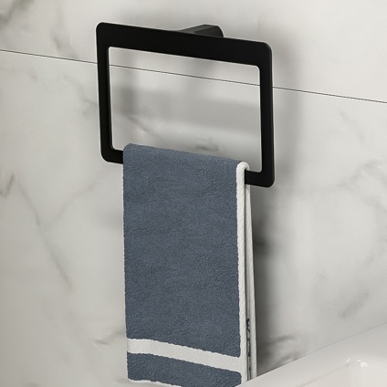 lifestyle image of origins living pirinei matt black towel ring